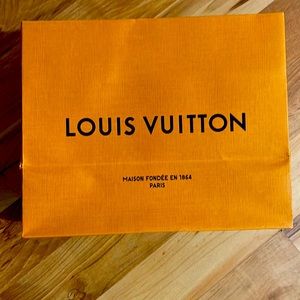 Small Used Louis Vuitton shopping bag.